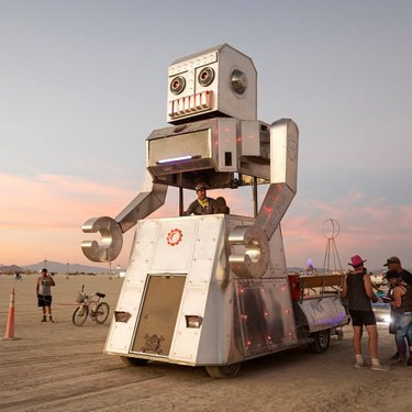 Ever had a dream of dancing with a giant roaming #robot in the desert? This is the @AutonomousDancingDiscoBot by @Chris_Wollard, a friendly dancing robot mutant vehicle that loves to wind up and get down. Seen here in 2019 (photo by @burningmarknixon).