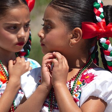 Memory from the California Trail Interpretive Center , Elko Nevada.
Standing in the sun before a performance was hot work.  Their expressions are priceless.  California Trail pioneers and their history helped form contemporary maps.  That is just the beginning of the story. #californiatrails  #nevadaheritage #elkonevada  #balletfolklorico  #folklorico #southernnevadaconservancy  #dance  #dancer  #dancersofinstagram