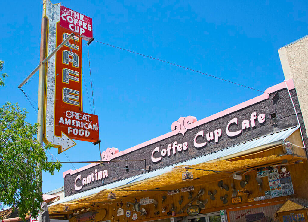 sign and front entry of the coffee cup