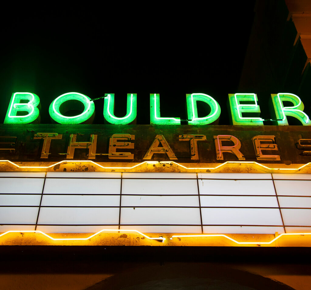 neon sign at the boulder city theatre