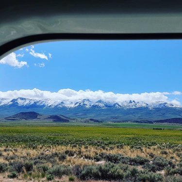 Snow-capped East Humboldt Range basking in the afternoon Sunlight. Can't wait till the road to Angel Lake opens up.
#travelnevada #clovervalley #snow #june #greatbasinhighway #windowview #westernsky #rubymountains #greenvalley #springsnow #humbodlttoiyabenationalforest #truckdriving