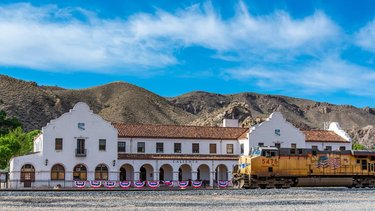 Union Pacific Train passing by the historic depot in Caliente, NV
