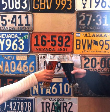 Want to leave your mark at the brewery? Bring in your old license plate to hang on the wall!