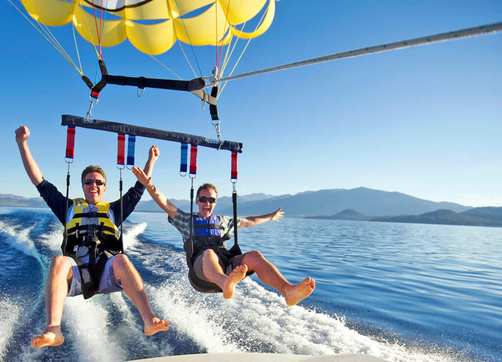 two parasailers over zephyr cove