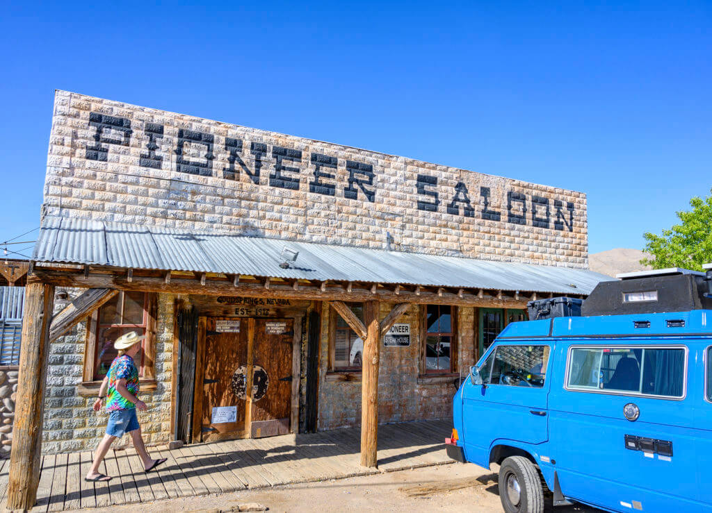 blue van parked in front of goodsprings pioneer saloon