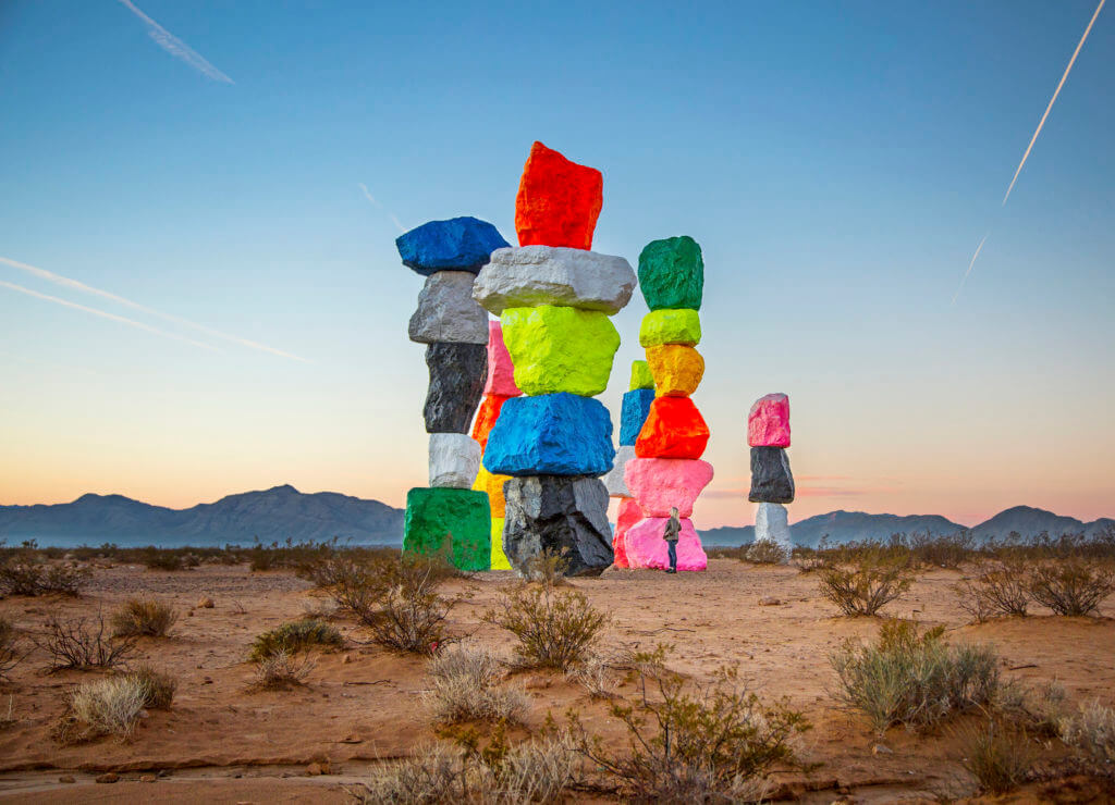 colored boulders stacked at seven magic mountains