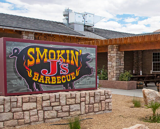 flaming pig sign for smokin js barbecue